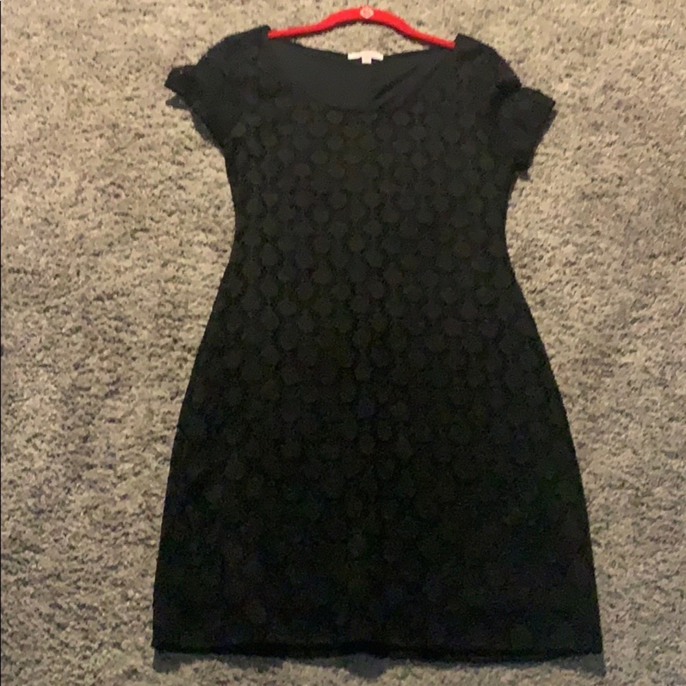 Very cute! Never been worn little black dress.